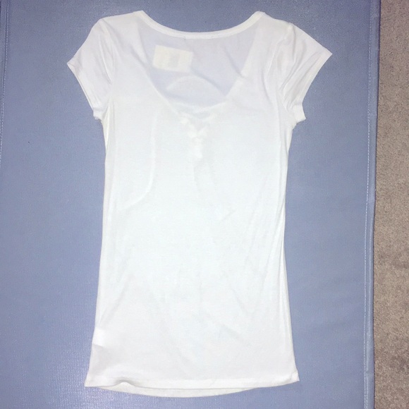 Donating soon! Short sleeved white Lace up top- S - Picture 4 of 5